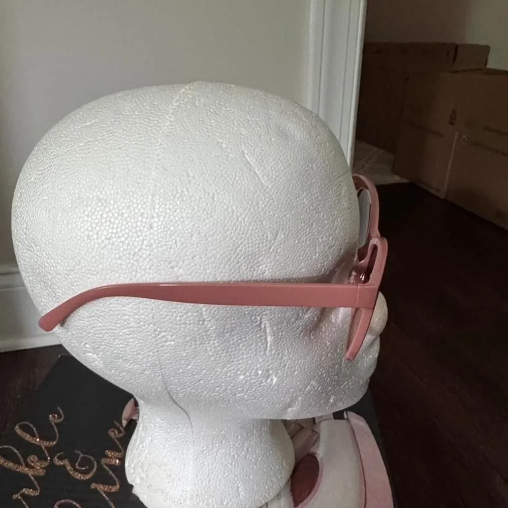 Pink sunglasses with brown lenses